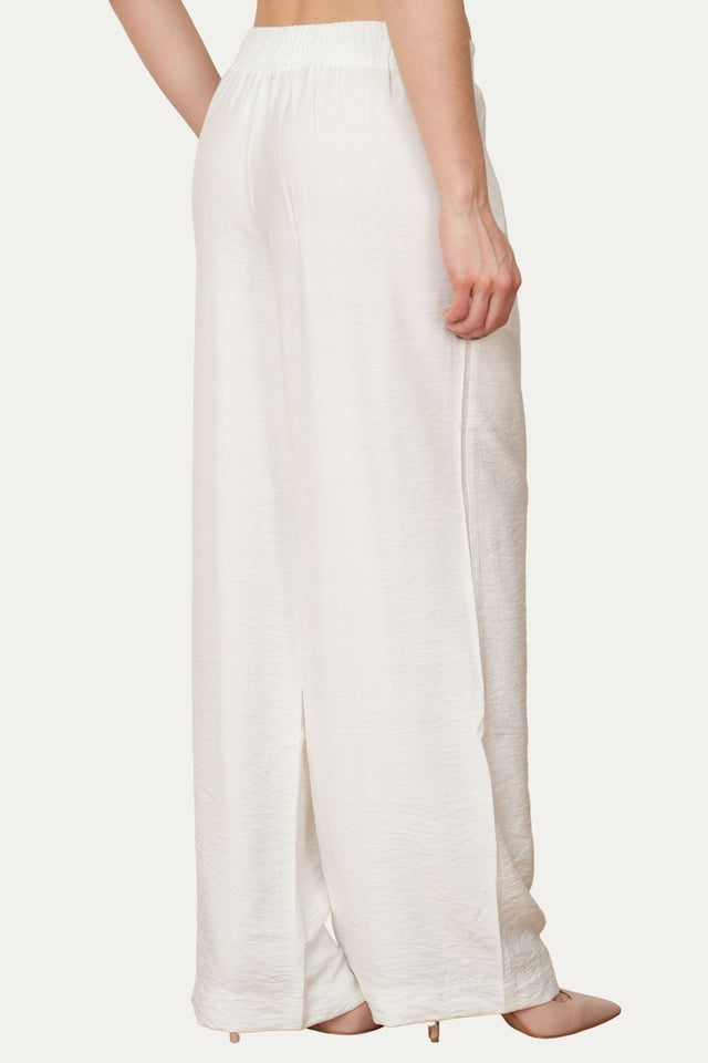 Pantalone palazzo con elastico in viscosa strutturata - Bianco