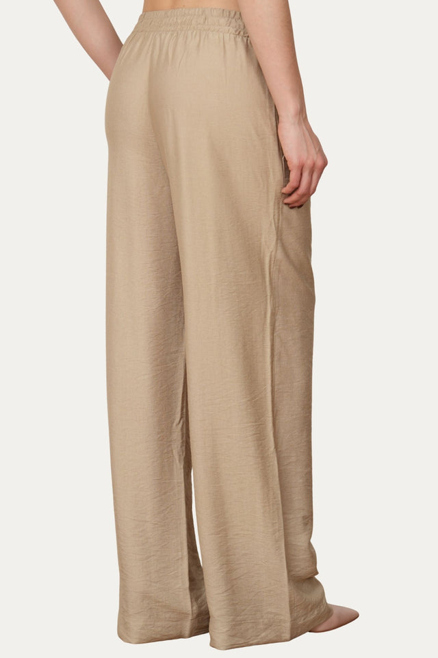 Pantalone palazzo con elastico in viscosa strutturata - Crema