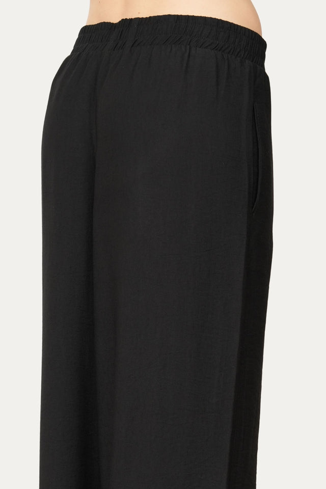 Pantalone palazzo con elastico in viscosa strutturata - Nero