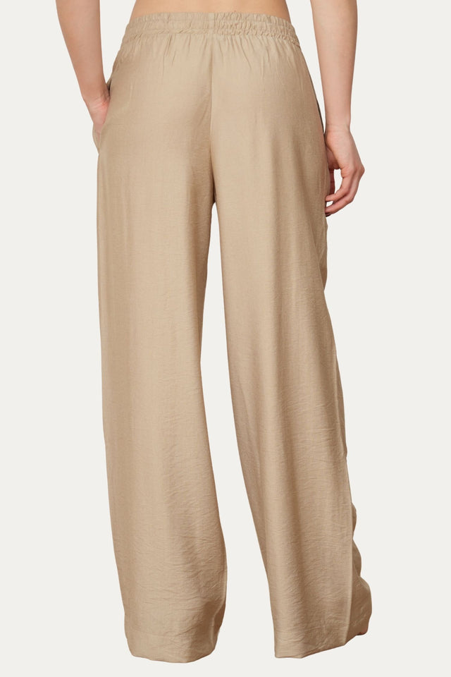 Pantalone palazzo con elastico in viscosa strutturata - Crema