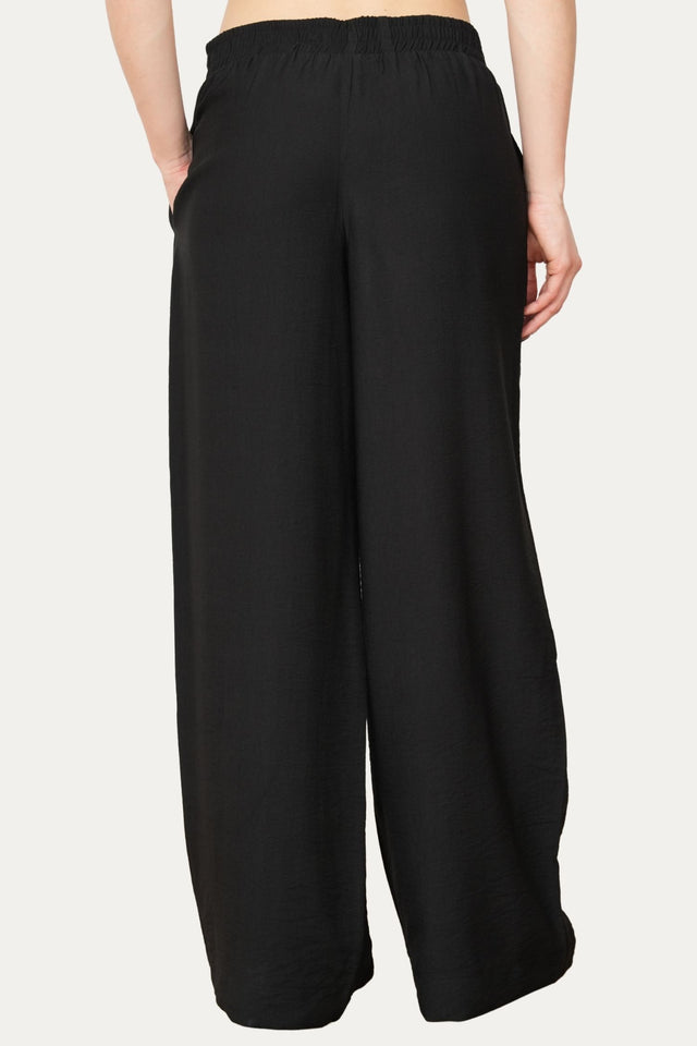 Pantalone palazzo con elastico in viscosa strutturata - Nero